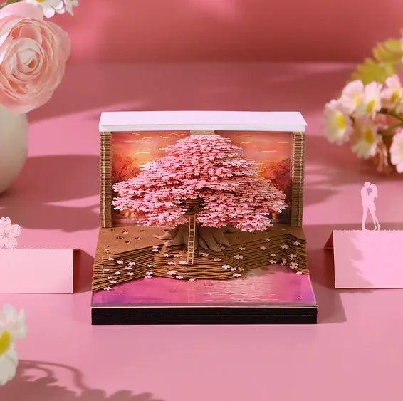 2026 desk calendar with 3D Cherry Tree paper sculpture on a desk, 8.5 x 8.5 x 6.4 cm