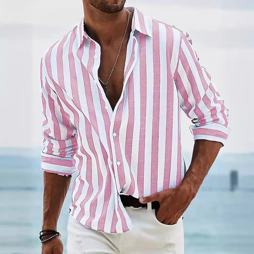 Man wearing a loose grey striped long-sleeved casual shirt with a cardigan style.