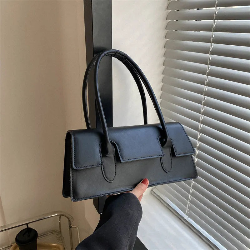 Women's black PU leather square shoulder bag with stitching detail and document compartment