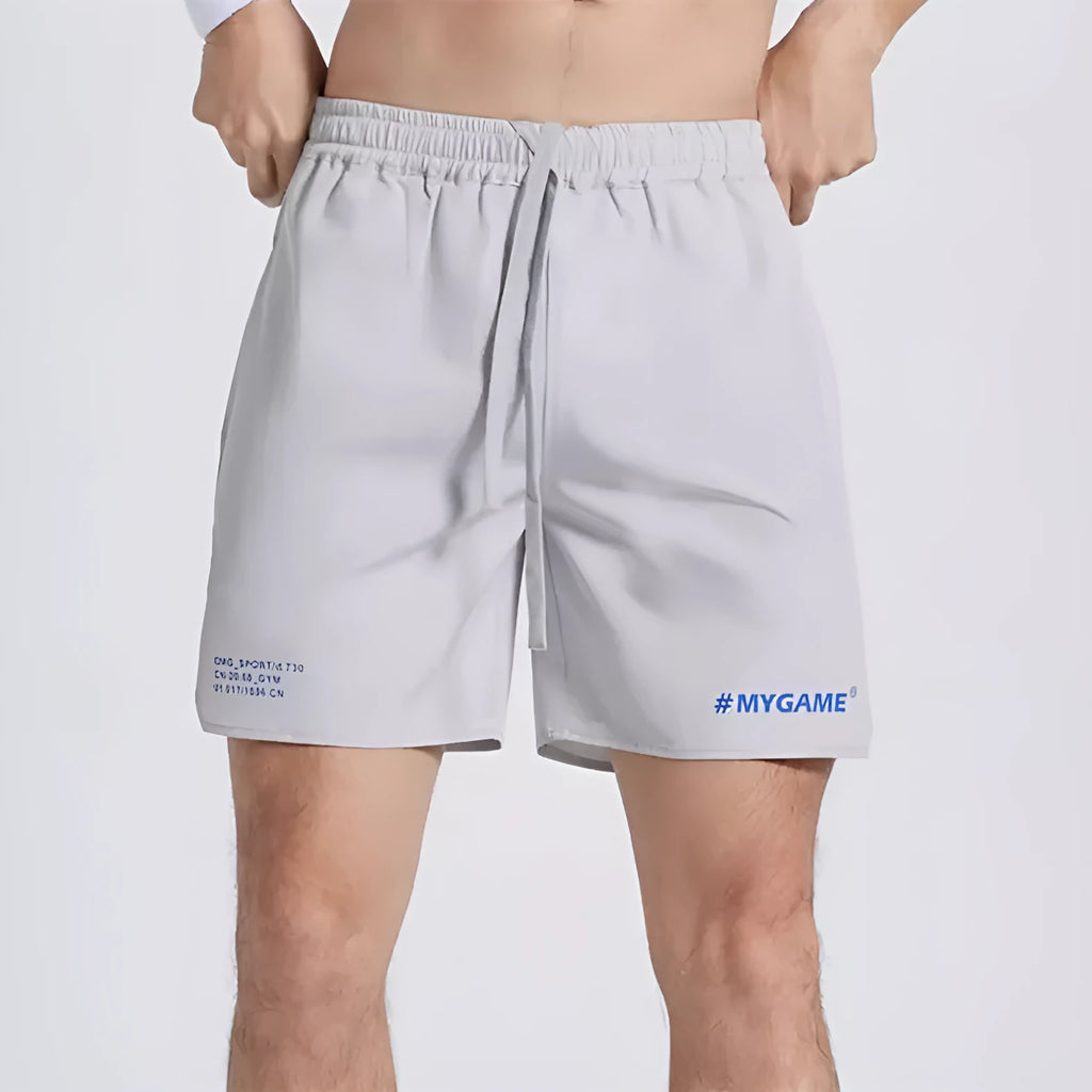 Men's four-point training shorts in a polyester blend for fitness and sports, shown in blue, black, grey, or white.