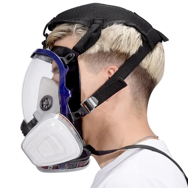 Blue edge spherical full face gas mask with trapezoidal canister and KN95 rating.