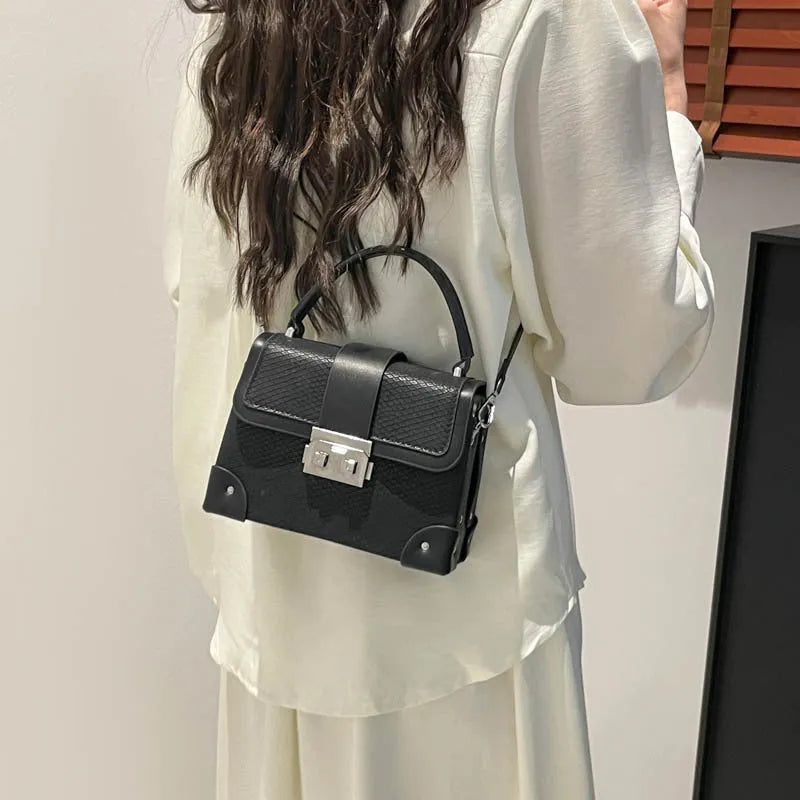 PU crossbody bag in horizontal square shape with sandwich outer pocket and seven colour options including black and orange