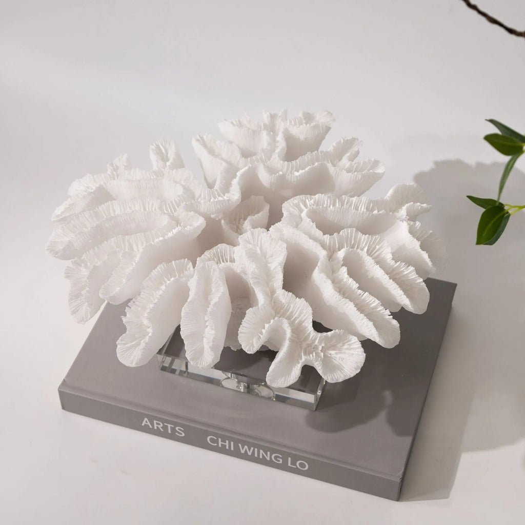Resin coral ornament in coral colour, 34x31x15cm, on a wooden desktop