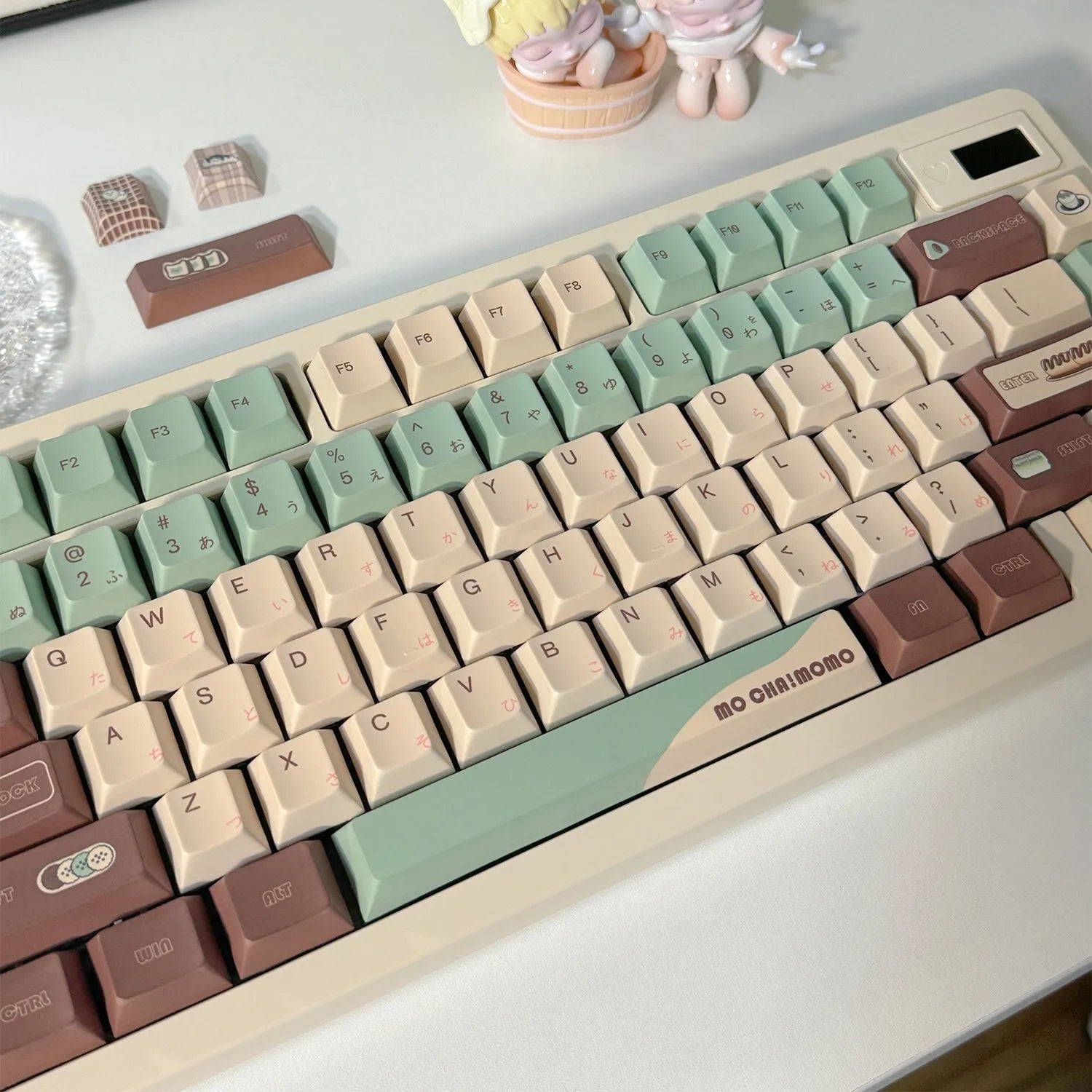 Matcha green mechanical keyboard keycap set with five-sided sublimation printing and key puller tool on a white background.