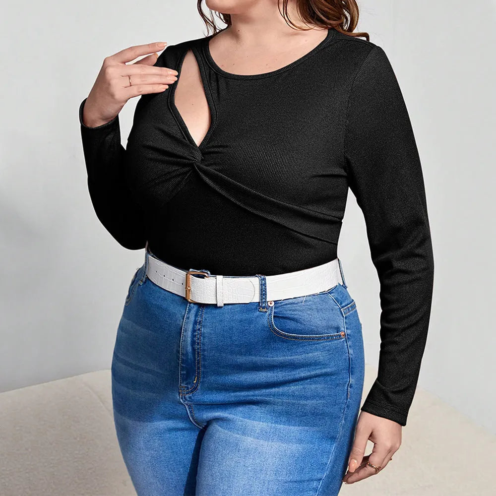 Women's slim-fit black knit pullover top with hollow-out design and long sleeves