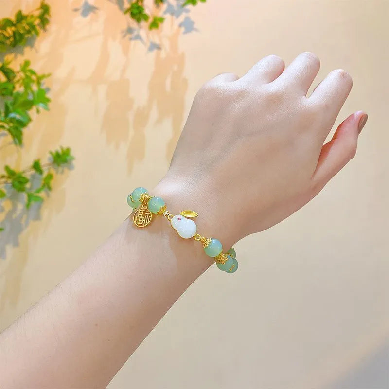 Chinese style glass bamboo leaf bracelet for women with manual craft details.