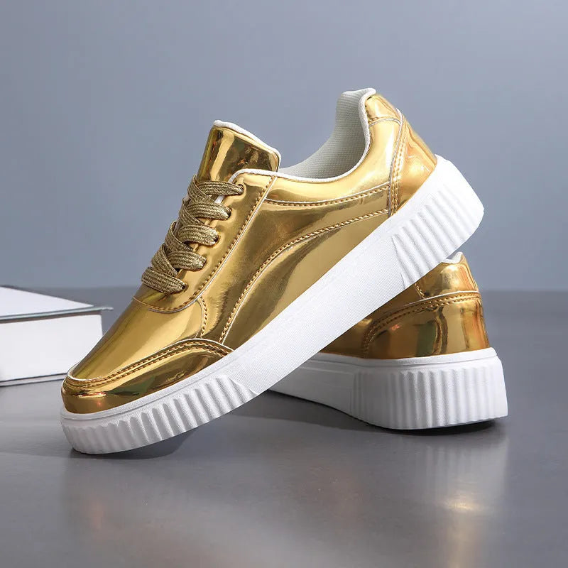 Rose gold sequinned platform sneakers with round toe and thick MD sole on a white background