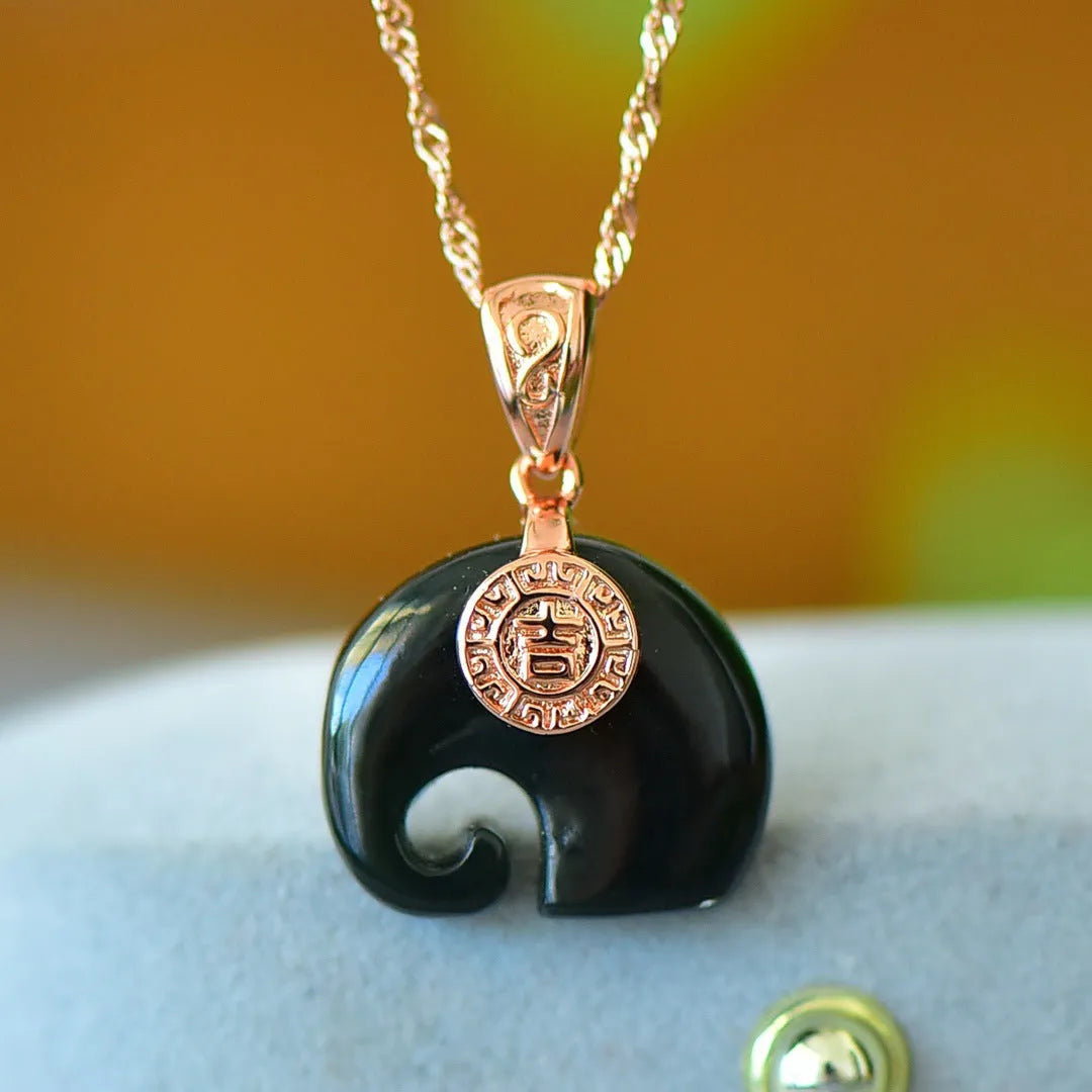Copper inlaid natural Hetian grey jade pendant with ink blue accents on necklace