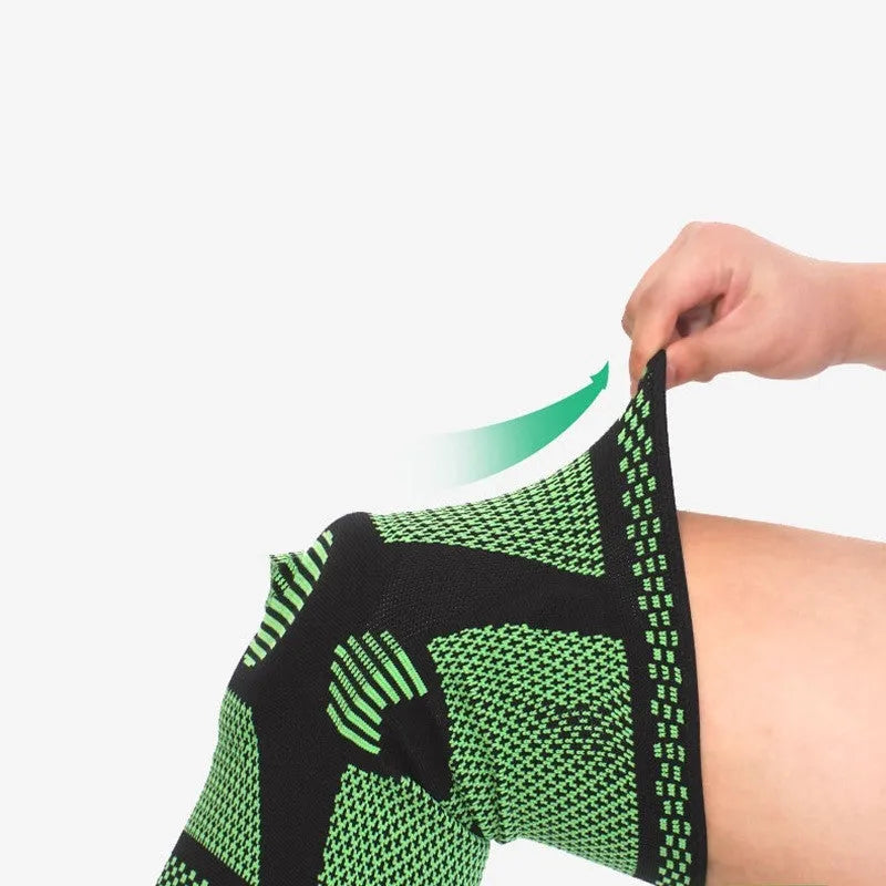 Silicone spring sports knee pad in polyamide, shown in blue, on a leg.