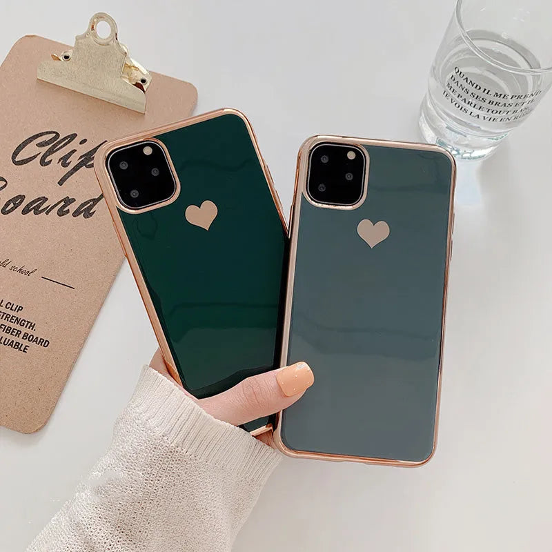 Solid colour TPU back cover phone case for iPhone models on a plain background