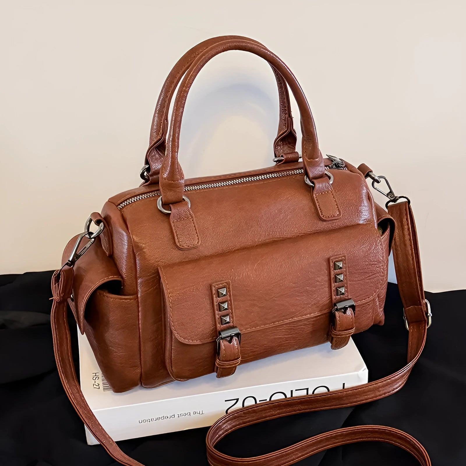Vintage-style square messenger bag in PU leather with contrast stitching, shown in multiple colour options.