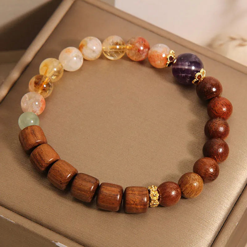 Women's bracelet with pineapple yellow tower crystal, ebony amethyst tones, pearl and rhinestone decorative elements