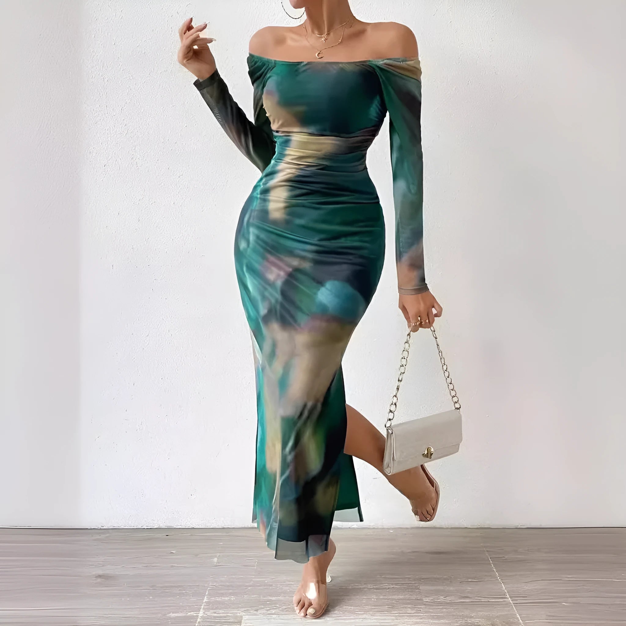 Women's long green mesh dress with fishtail skirt, gradient colour print, pleats, and a square neckline.