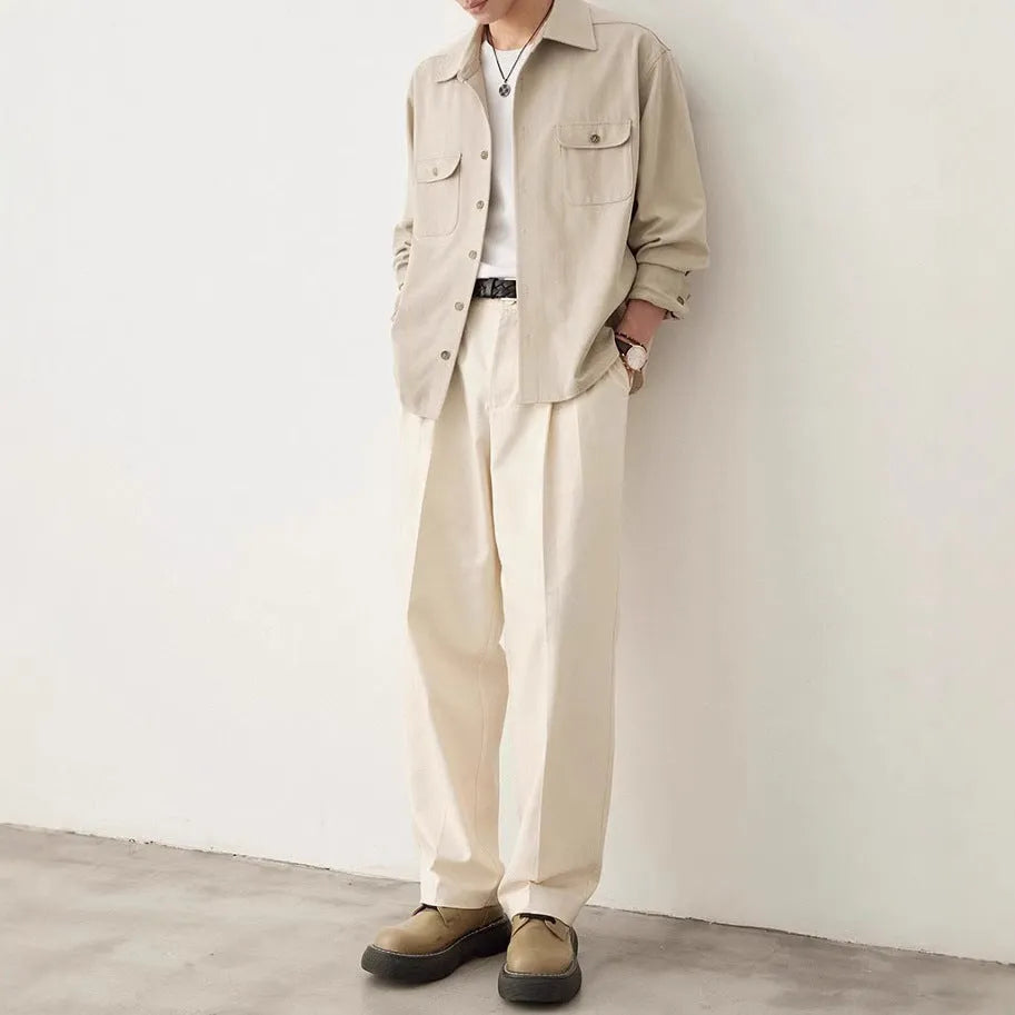 Men's light sand rice coloured lapel shirt with long sleeves on a hanger
