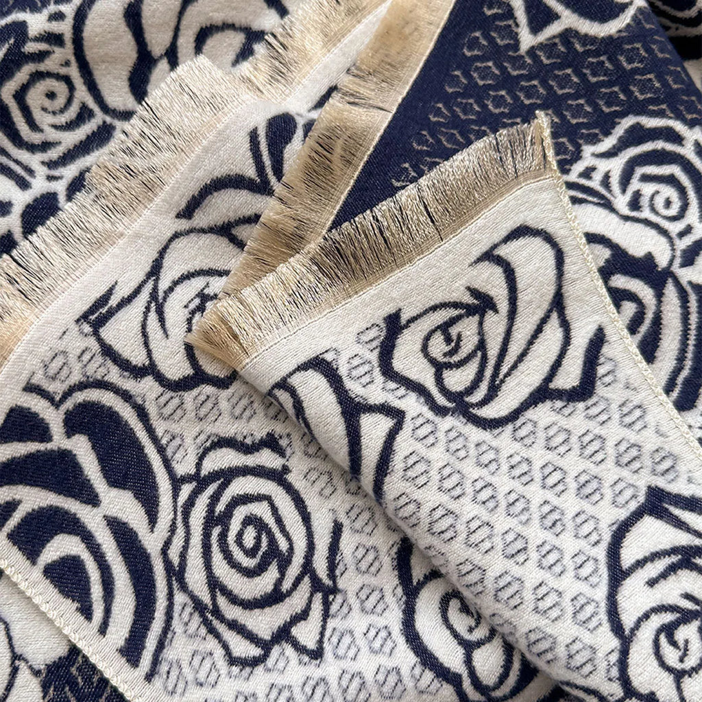 Grey imitation cashmere winter shawl with tassels, shown draped.