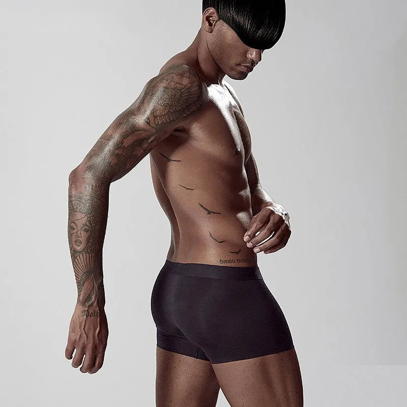 Men's seamless modal underwear in solid colour with mid waist design and shaping functions