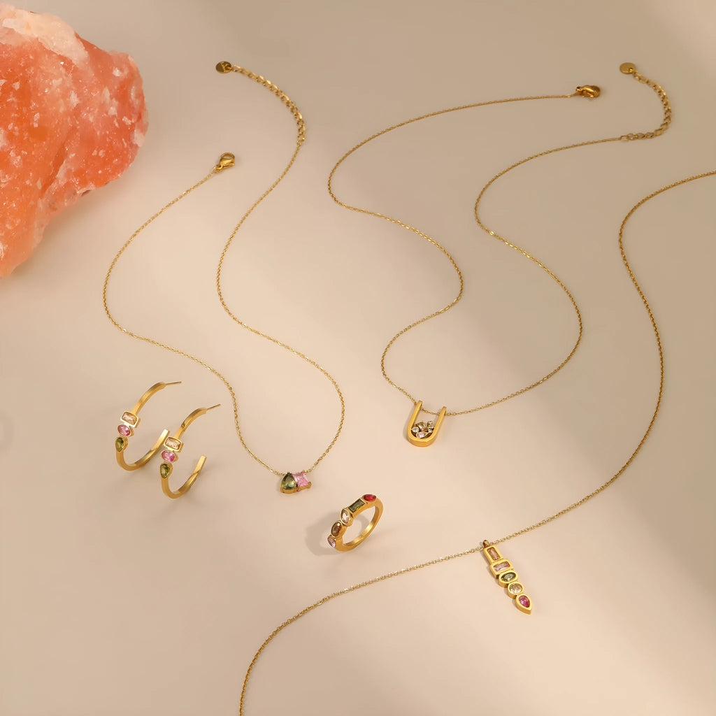 Geometric colour zircon gold-plated necklace, ring, and earrings set on 18K stainless steel.
