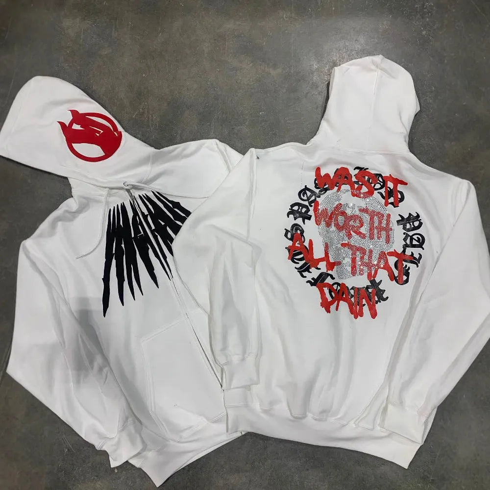 Black loose hooded sweatshirt with white printed skull and rhinestone detail, cardigan style.