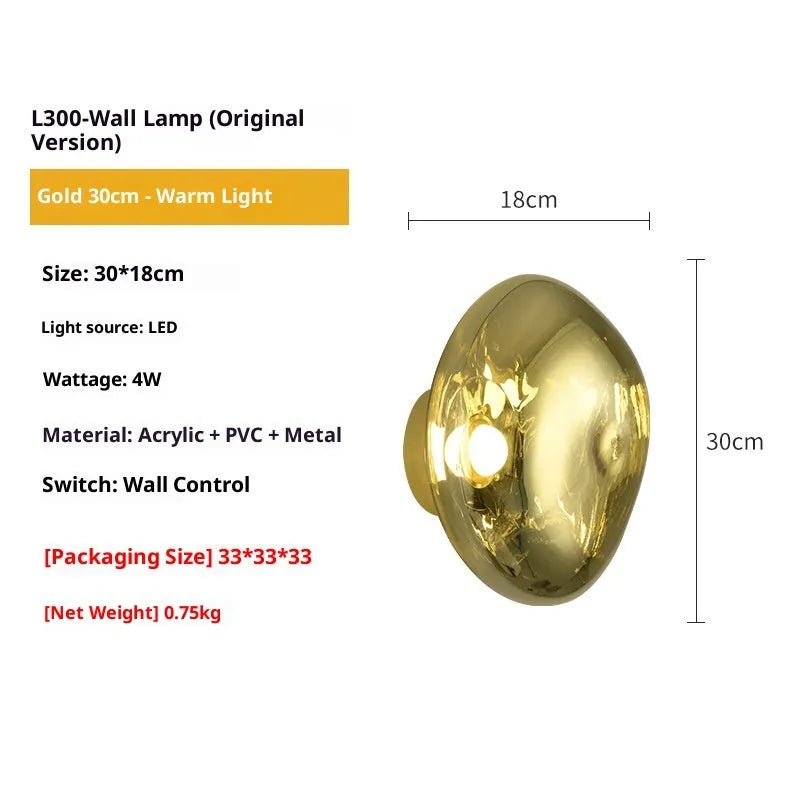 Modern creative lava wall lamp with acrylic shade, 30x18cm, gold finish, on a wall emitting warm light