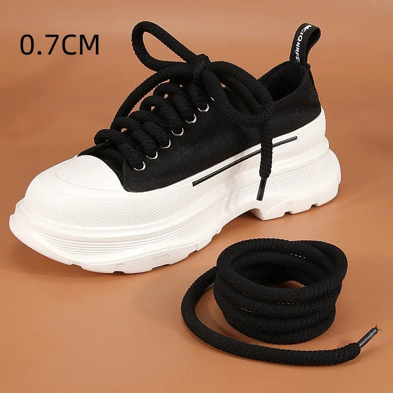 Solid colour round woven shoelaces for bread shoes in white, beige, and black.