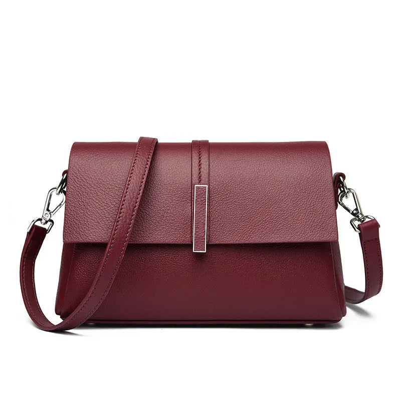 Women's cowhide tote bag in first layer leather, 24x15x9cm, with double shoulder straps, shown in black, gray, or wine red.