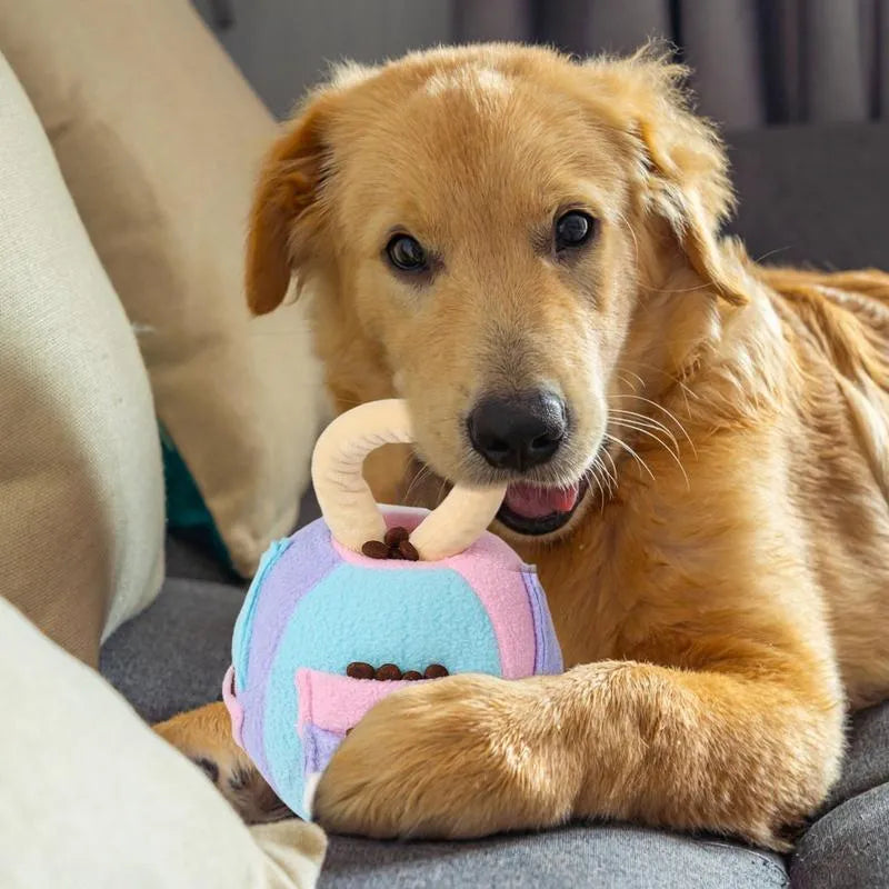 Green and pink plush squeaky ball dog toy with treat pockets for small medium dogs