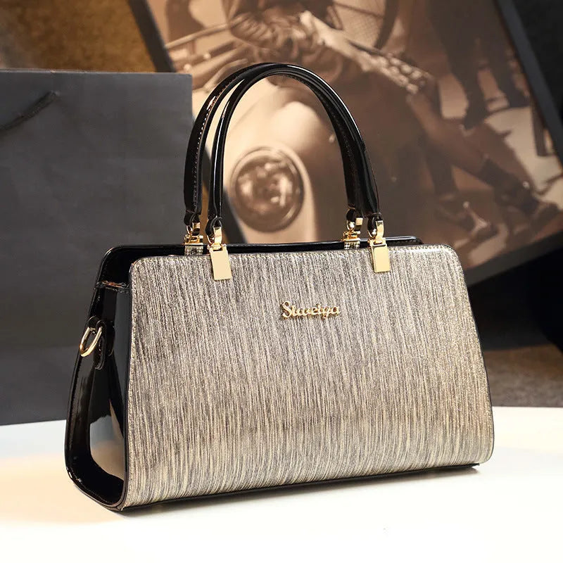 Medium PU leather messenger handbag in horizontal square shape with gold or silver contrast colour