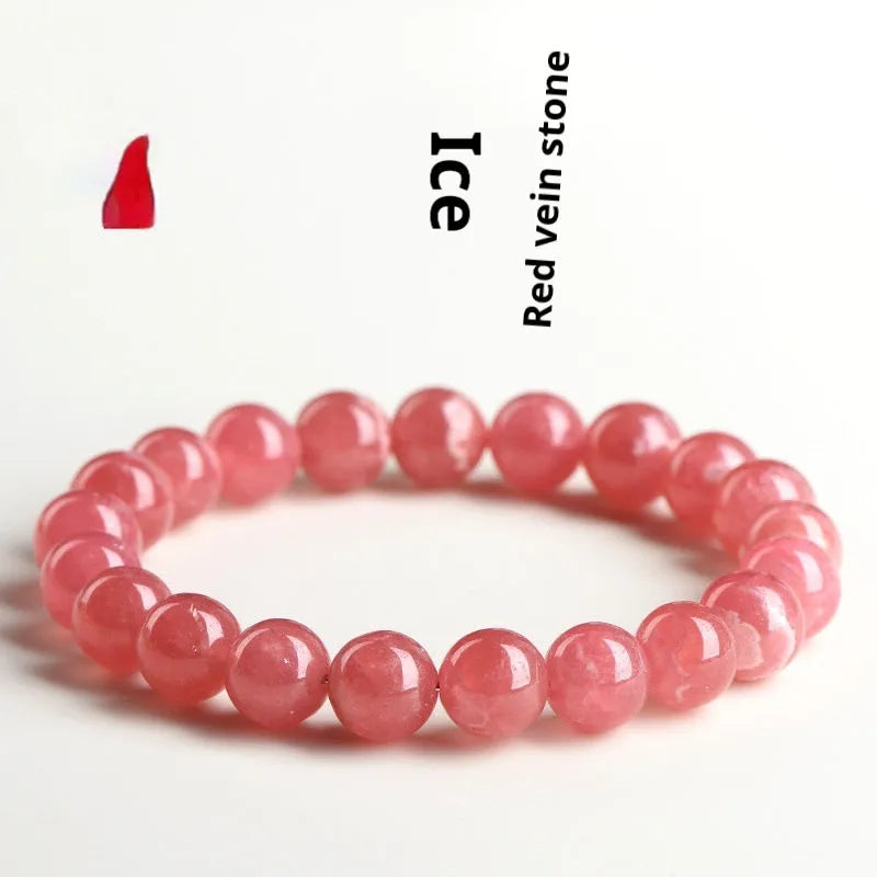 Women's red rhodochrosite crystal bracelet with geometric beads and longevity lock clasp