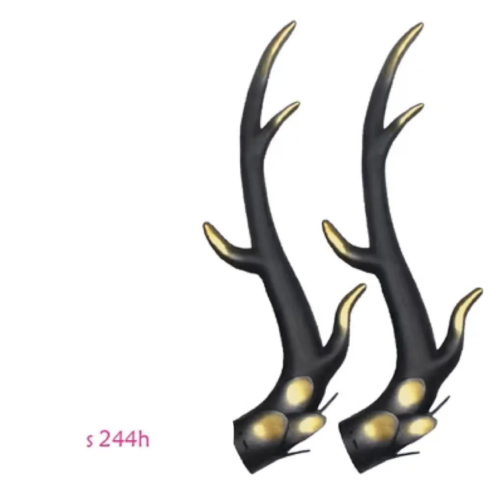A pair of black resin dragon horn decorations for motorcycle helmet customisation.
