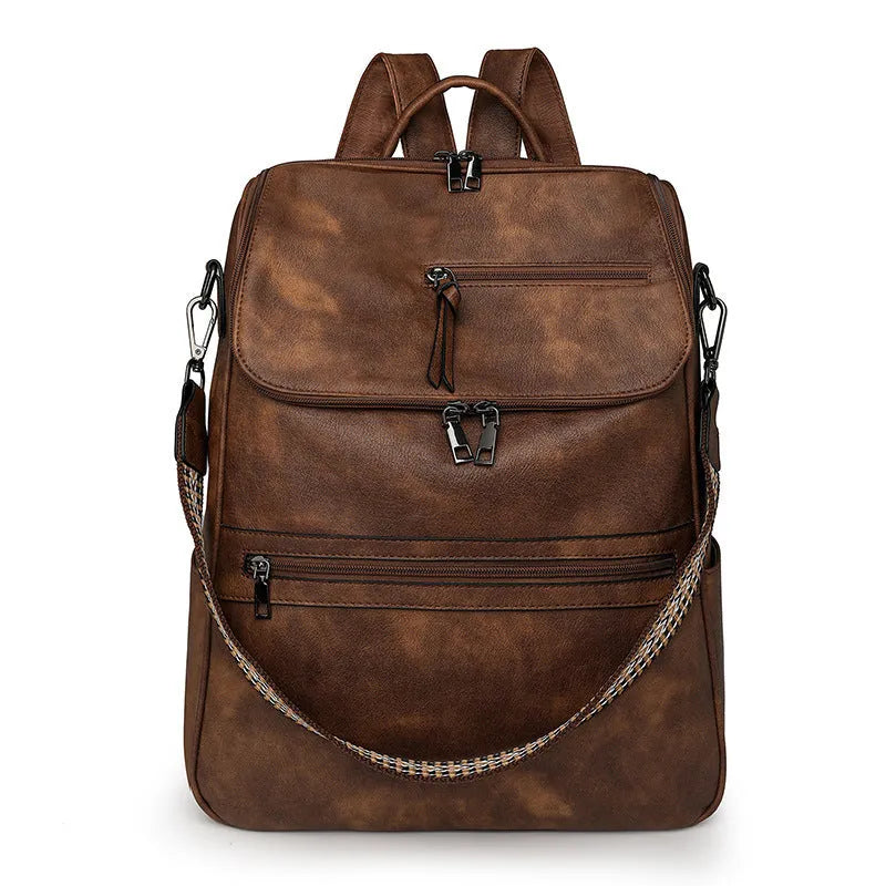 Retro PU leather unisex backpack with curved shoulder straps in solid colour options