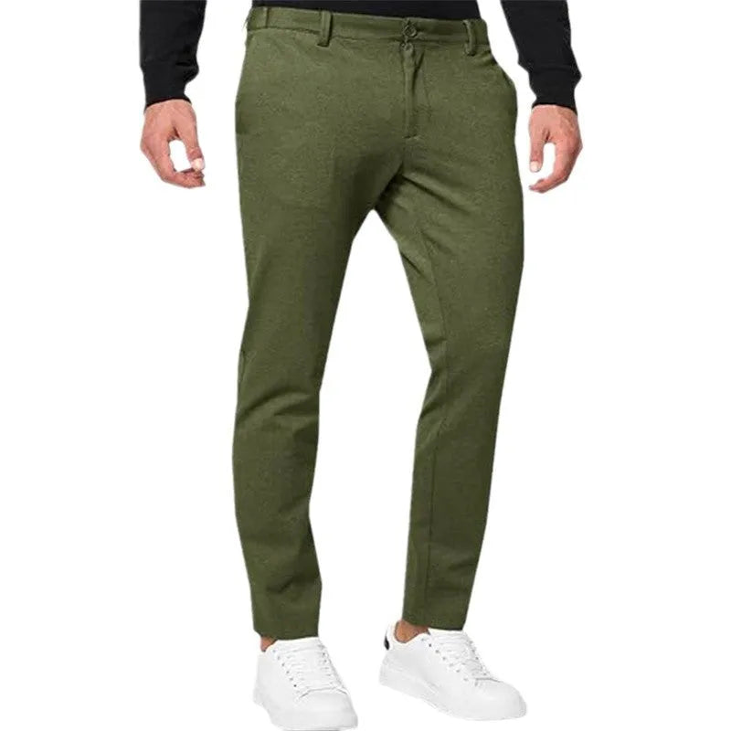 Men's slim-fit tapered chino trousers in a solid colour, showing the tapered leg and casual style.