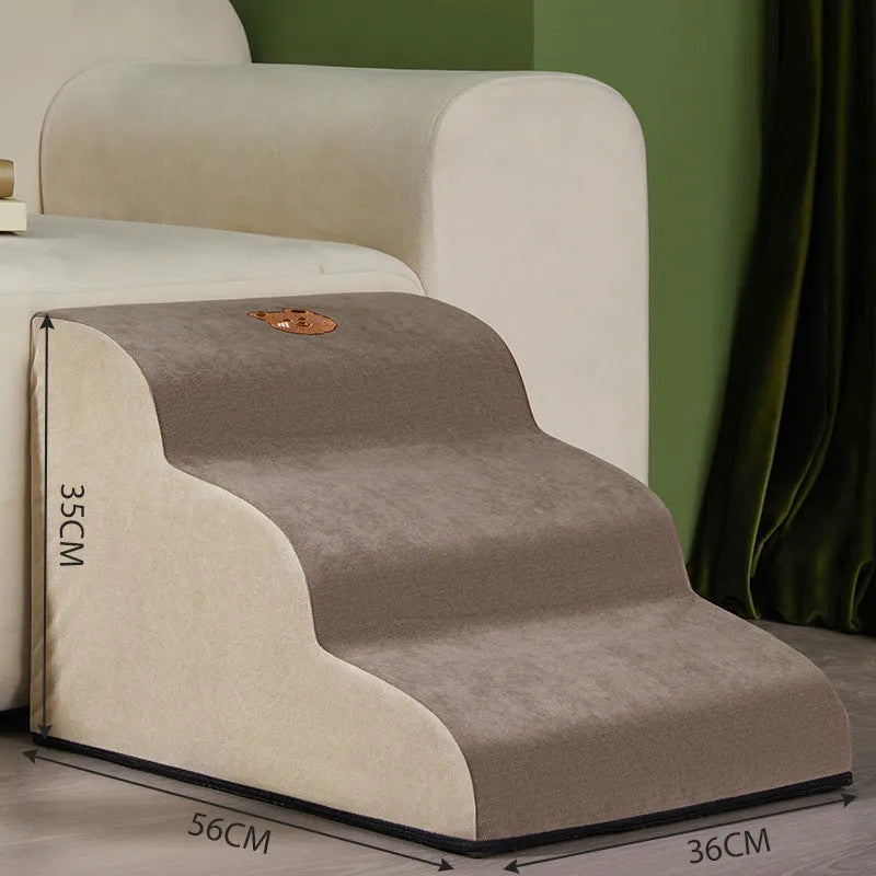 Brown foam pet ramp stairs with non-slip surface on a carpeted floor