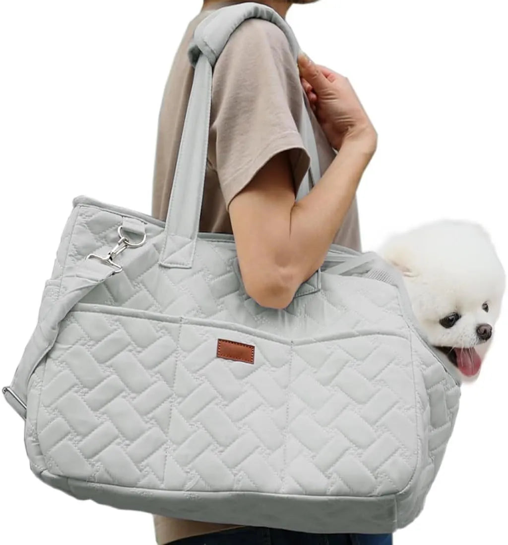 Grey pet carrier handbag with mesh panels and multiple pockets for cats and small dogs