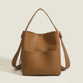 Soft PU bucket messenger bag in elephant gray with sewing line detailing and single shoulder strap