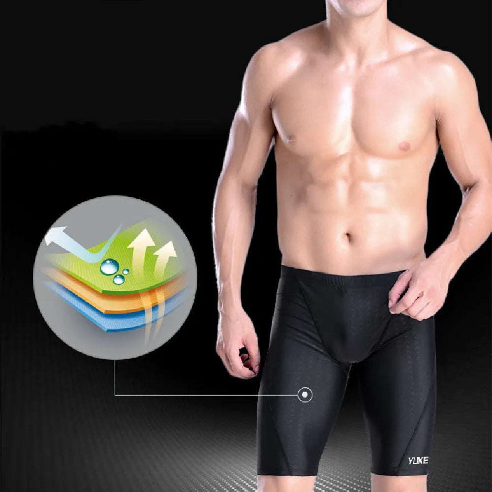 Men's black five-piece swimming set showing trunks, goggles, cap, ear plug nose clip and swimming bag