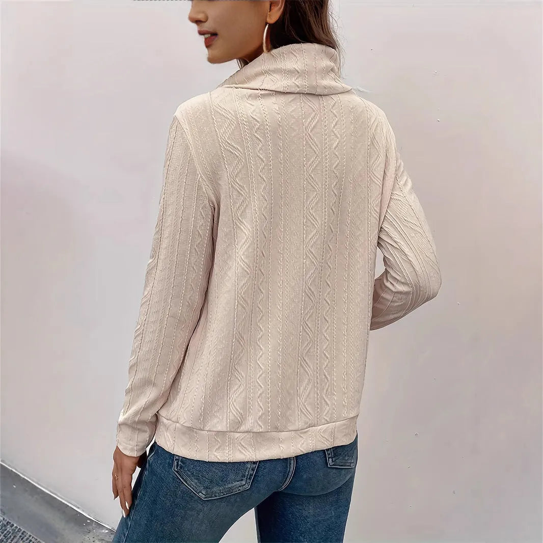 Apricot coloured long sleeve hooded pullover sweater with drawstring on mannequin