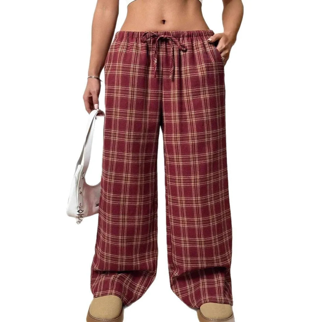 Women's loose fit plaid trousers with drawstring waist and side pockets in polyester fabric