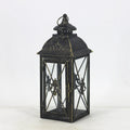 Black and white wrought iron floor-standing storm lantern with tempered glass panels in three sizes for courtyards.