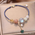 Hand-woven women's bracelet with peace buckle, crystal beads, and sequins in red, green, or blue.