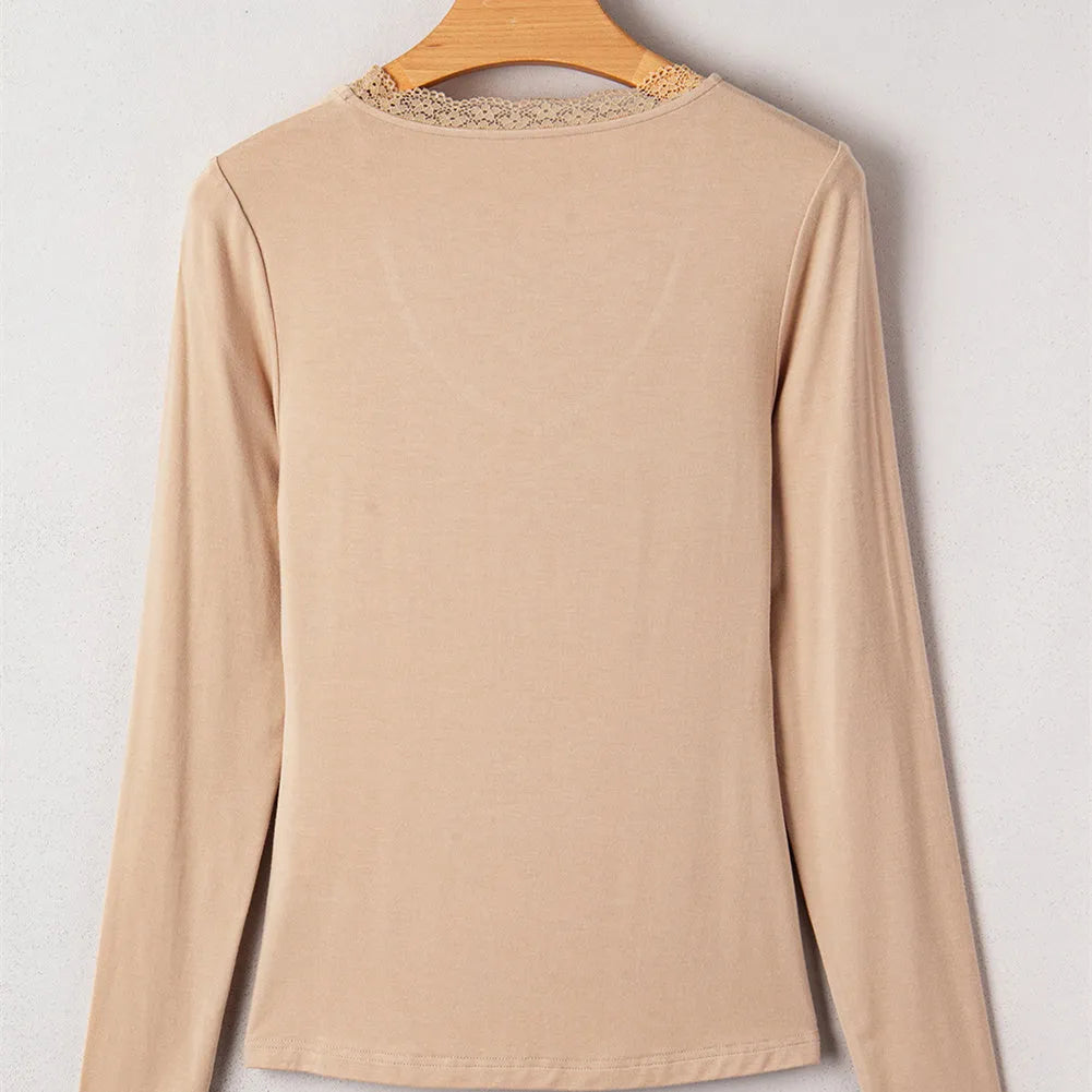 Long sleeve casual top with lace trim detail in solid colour option showing slim fit styling