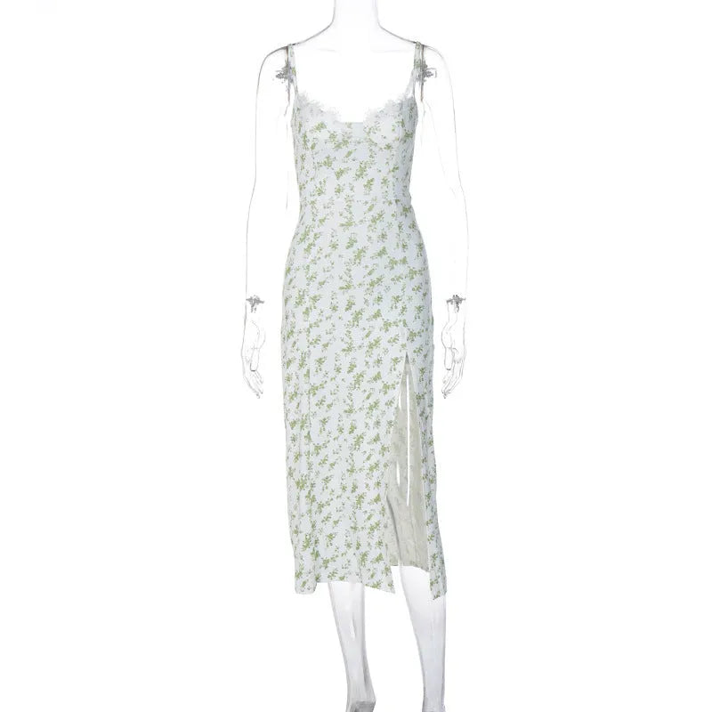 Women's blue lace print long dress with suspender straps and a side slit.