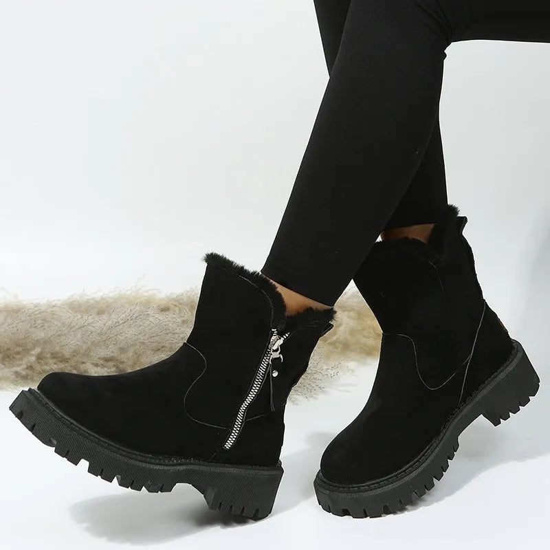 Women's black faux suede snow boots with high top, square heel, and side zipper closure