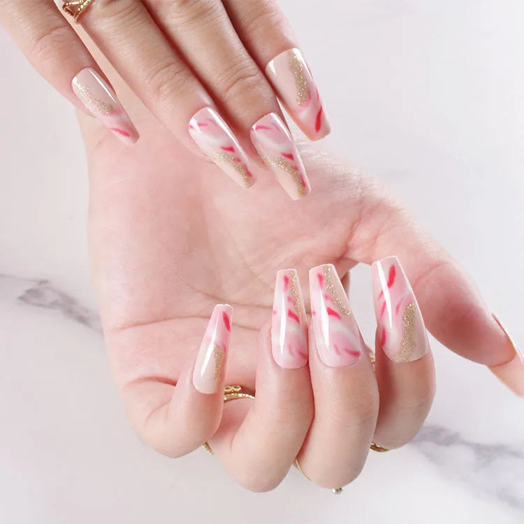 Wearable manicure set with 24 medium false nails in rose, tulip, leopard print, and XINGX patterns, plus glue.