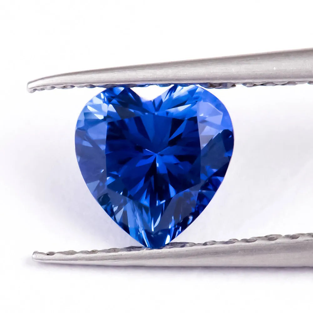 Royal blue loose gemstones showing heart shape cut in various carat weights