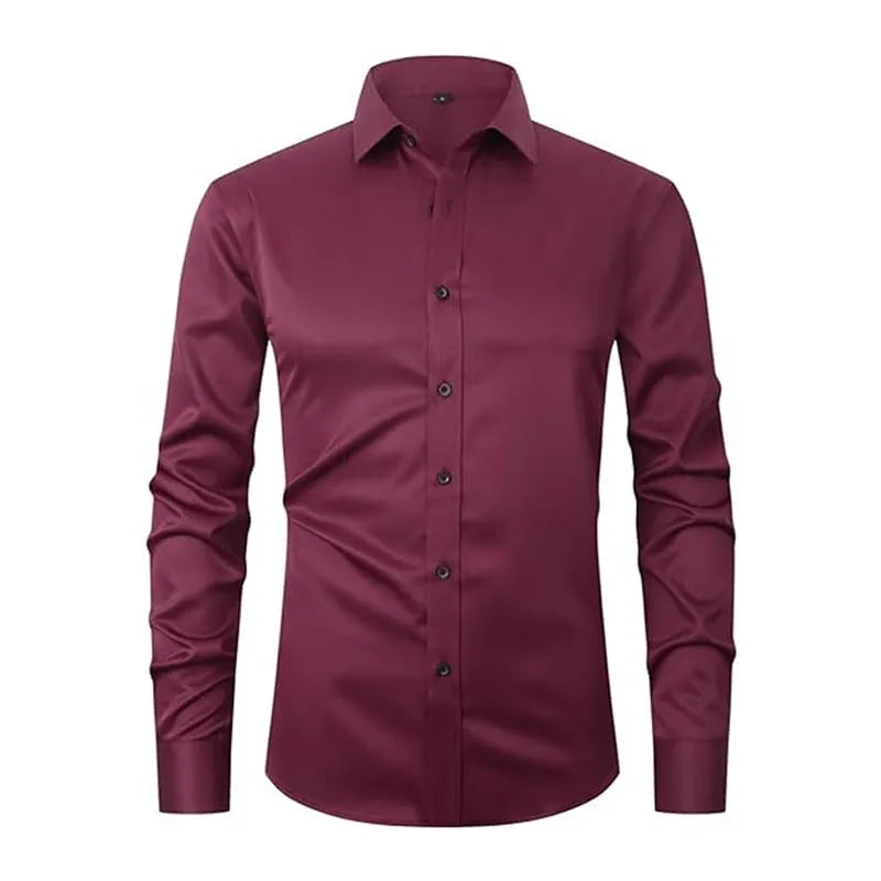 Man wearing a stretch long sleeve polyester work shirt in a solid colour, showing the fit and long sleeve design.