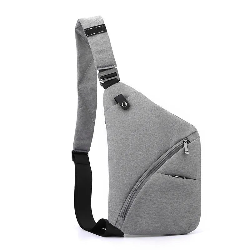 Men's black Oxford cloth chest bag worn on left shoulder with letter accent detail