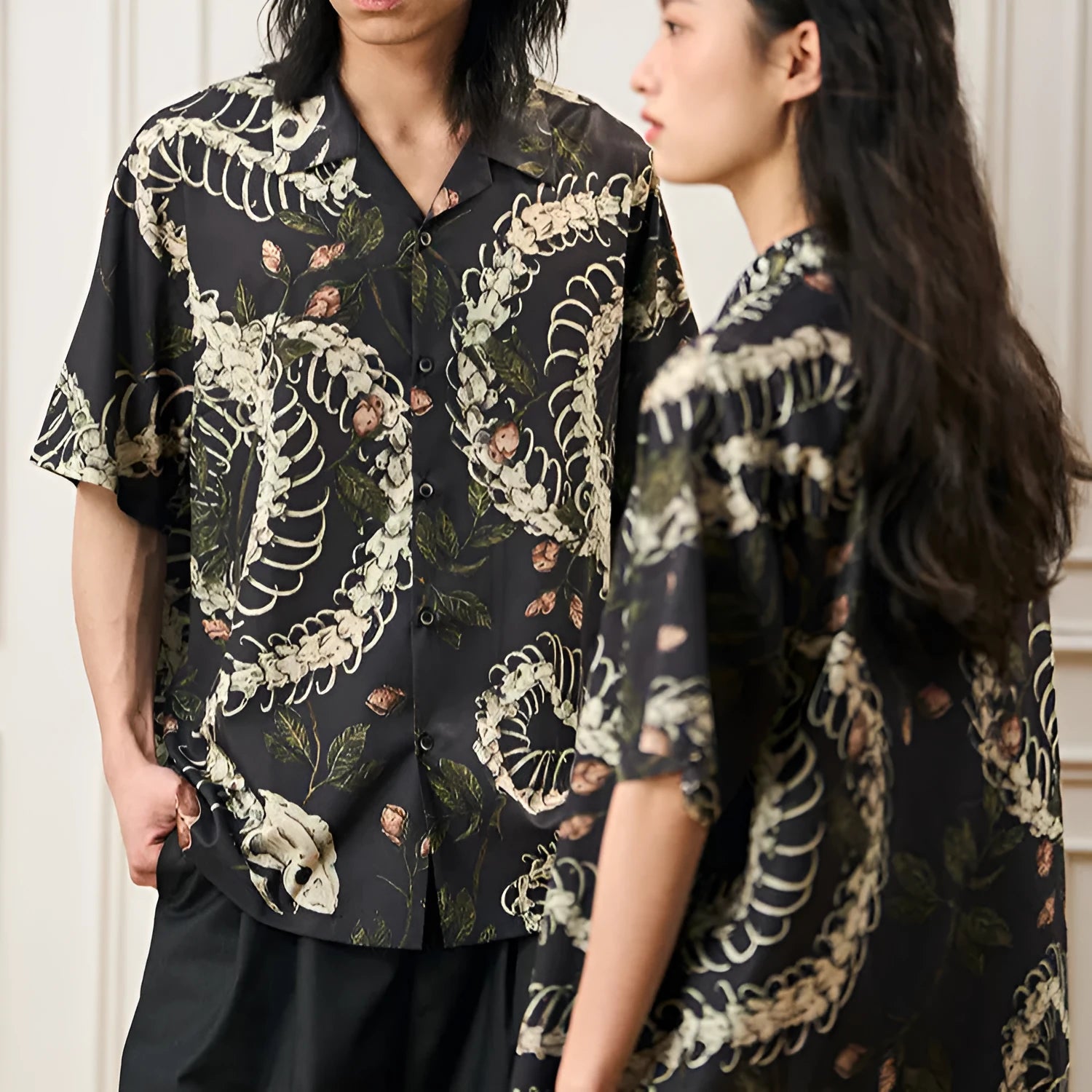 Original snake bone and flower pattern printed on a loose-fit, short sleeve Cuban collar shirt in various colours.