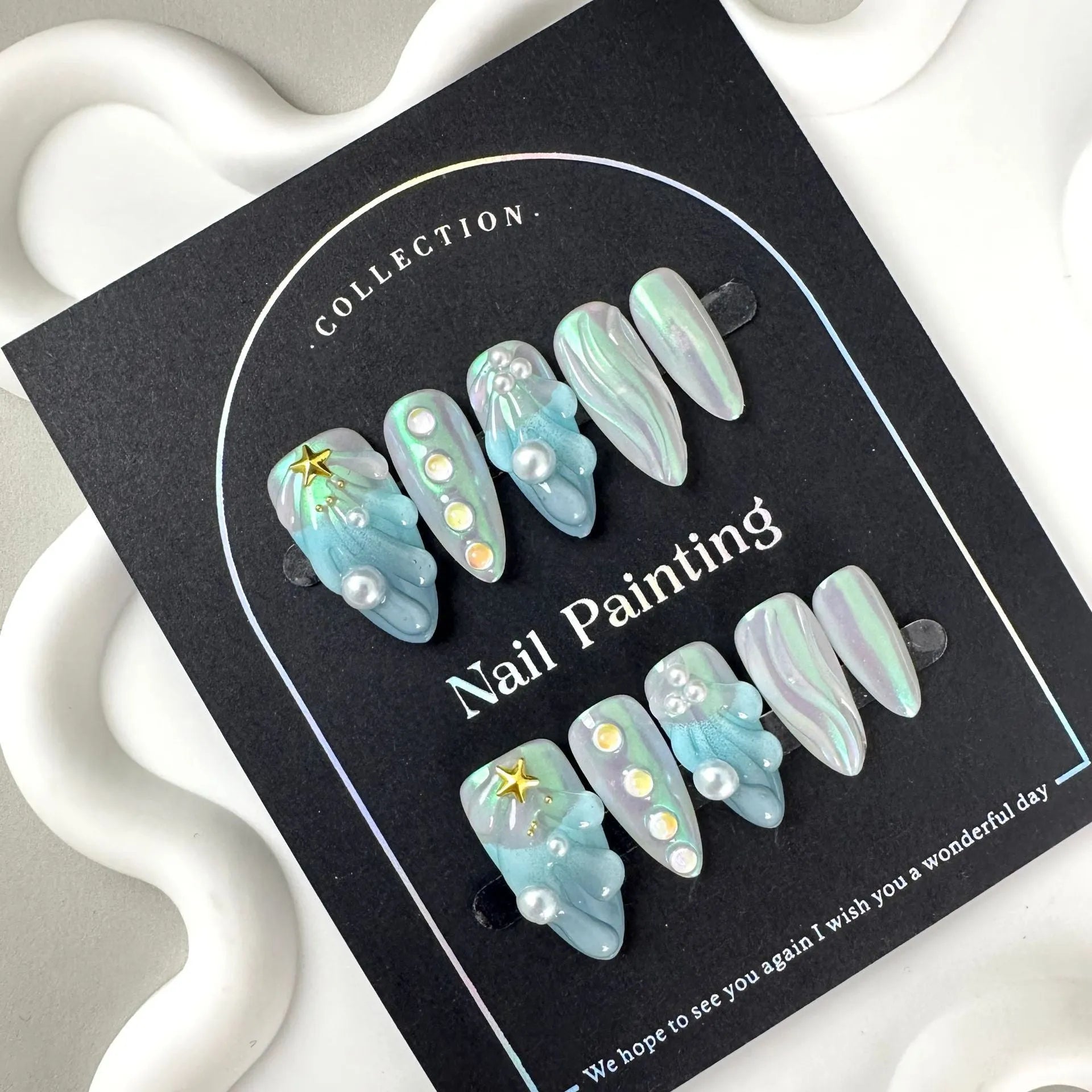 HAILANG blue plastic Shell Nail Stickers showing nail tips with shell design