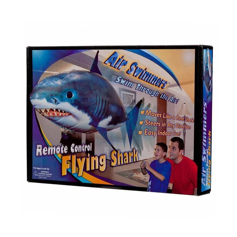 Large remote control shark inflatable balloon toy floating indoors with remote.