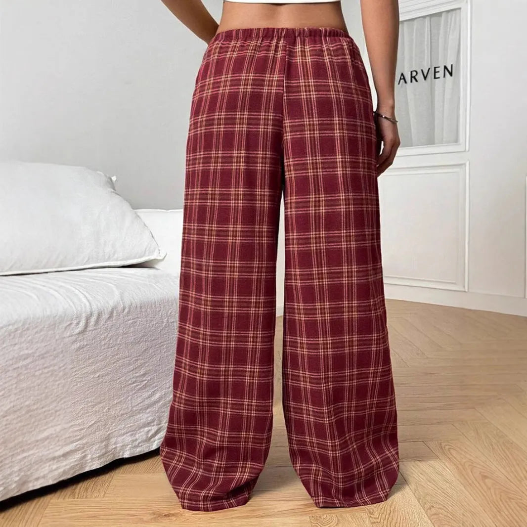 Women's loose fit plaid trousers with drawstring waist and side pockets in polyester fabric